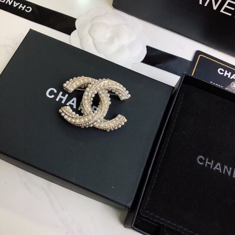 Ch**el brooches